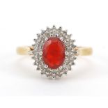 18ct gold orange stone and diamond cluster ring, possibly fire opal, size P, 5.0g