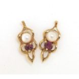 Pair of 9ct gold ruby and seed pearl stud earrings, 1.2cm high, 0.6g