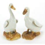 Pair of Chinese porcelain geese, mark to the base of one, the largest 10cm high