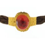 Antique unmarked gold cabochon carnelian and plaited hair necklace with engraved decoration, (