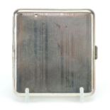 Silver coloured metal cigarette case with engine turned decoration, impressed Made in Japan, 8cm x