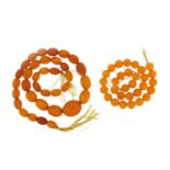 Butterscotch amber coloured bead necklace and bracelet, the necklace 40cm in length, total 37.0g