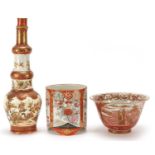 Japanese Kutani including a three footed vase and a bowl hand painted with flowers, the largest 29.