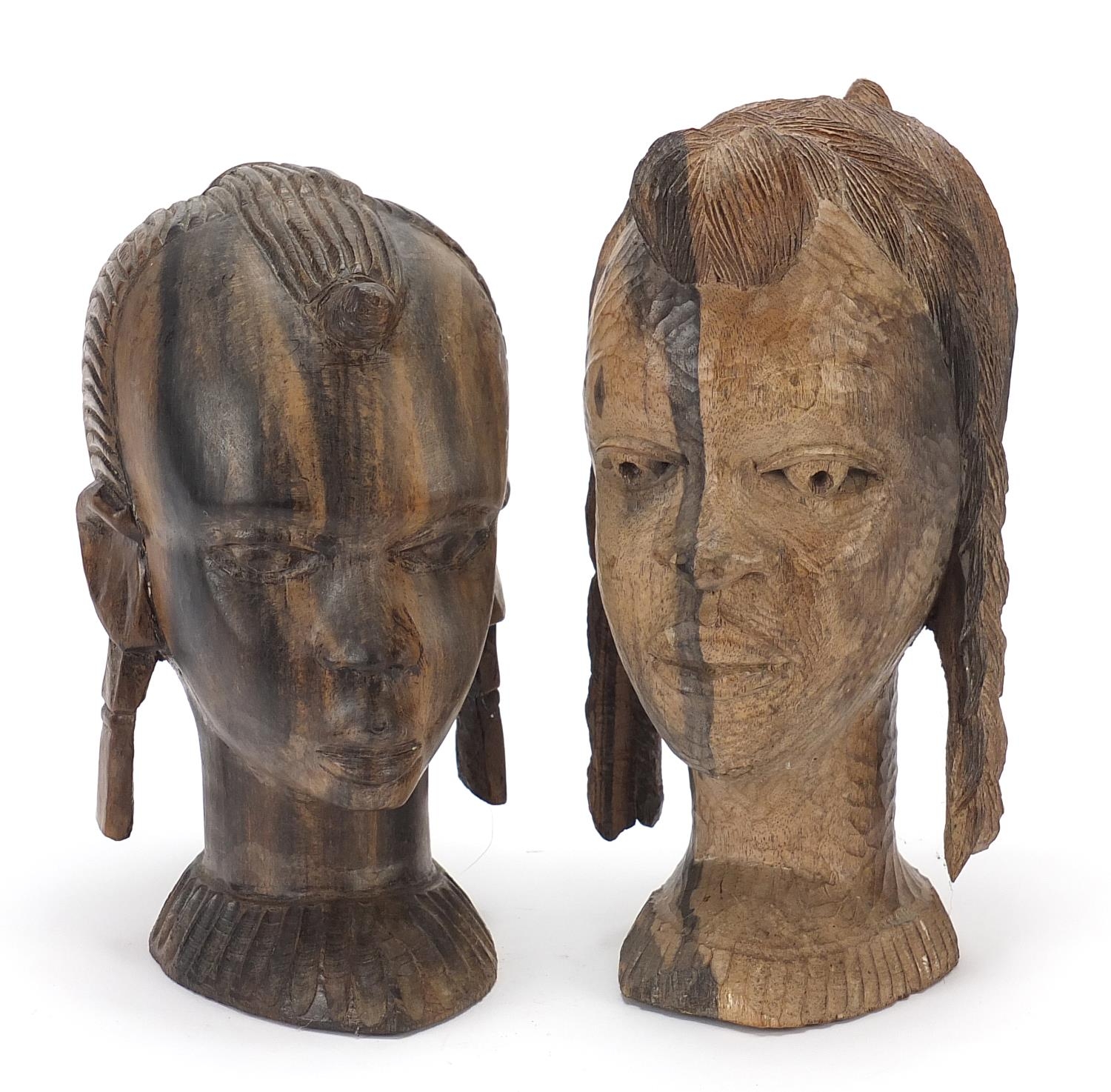Two African carved hardwood busts, the largest 23cm high