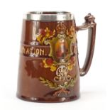 Royal Doulton tankard with a silver collar commemorating George V coronation, 12cm high