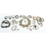 Silver jewellery including pendants on necklaces, rings, identity bracelet and cameo brooch, 90.0g