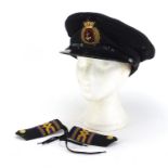 Naval interest peaked cap and pair of shoulder epaulettes