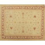 Large Indian hand woven beige ground rug, 532cm x 350cm