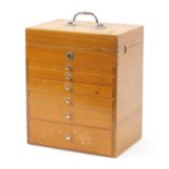 Lightwood six drawer dentist's cabinet with a lift up top, 40cm H x 33cm W x 23cm D
