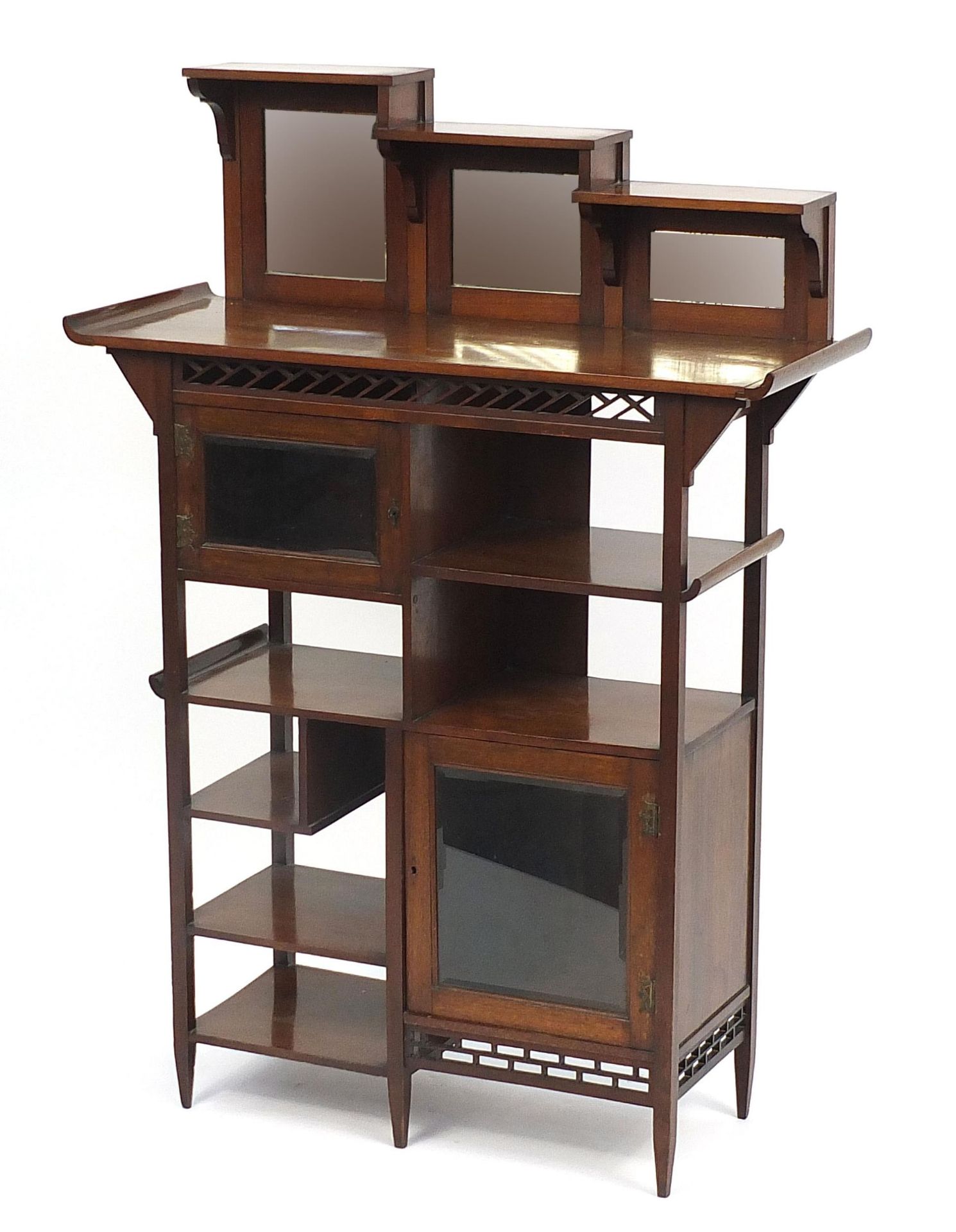 Arts & Crafts aesthetic mahogany cabinet in the manner of Liberty & Co with mirrored top and