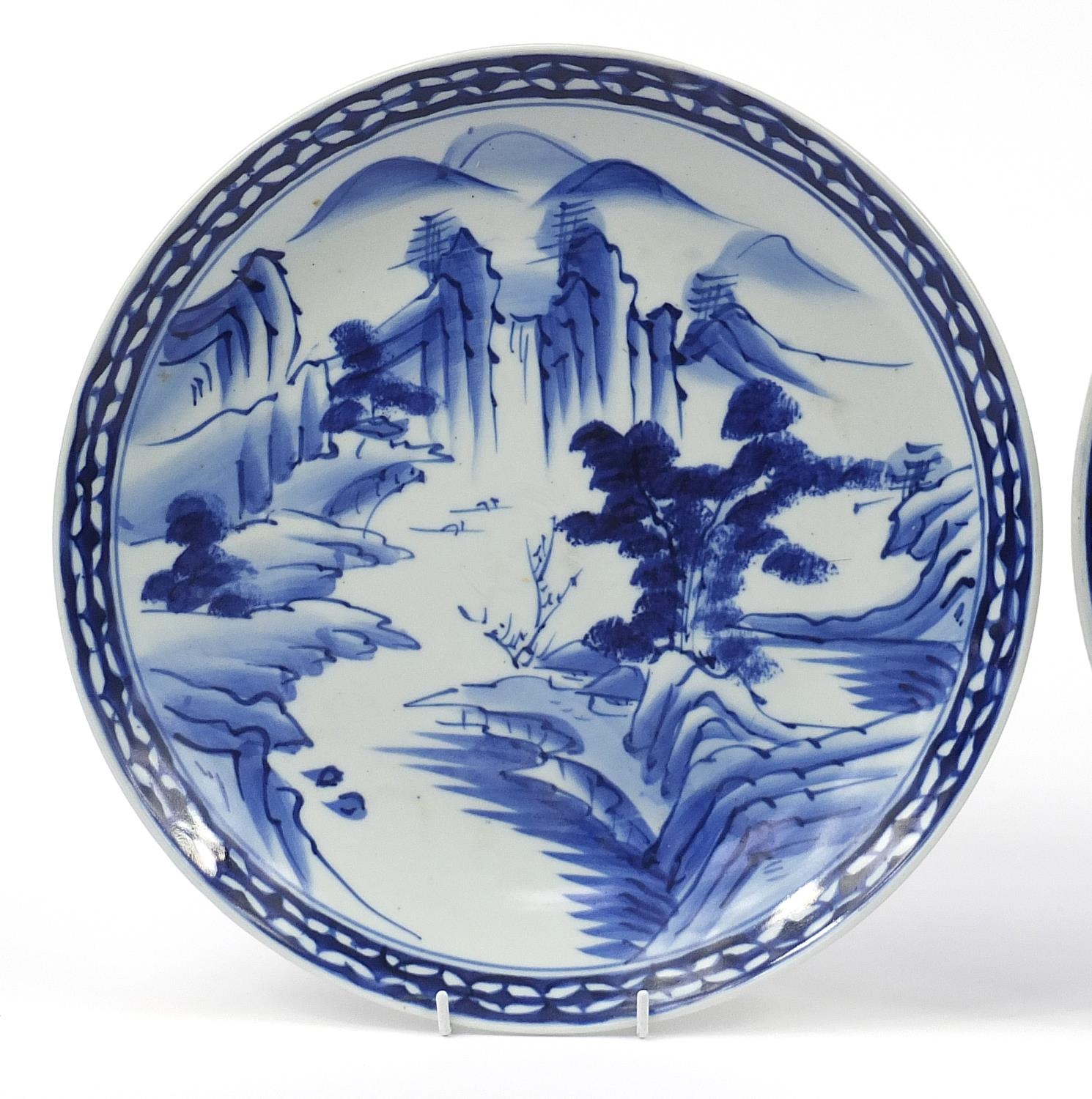 Two Japanese blue and white porcelain chargers, hand painted with mountainous landscapes, the - Image 2 of 7