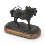 Patinated bronze workhorse raised on a wooden base, 11cm in length