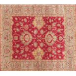 Indian hand woven red groud wool rug, 307cm x 254cm