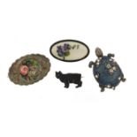 Three silver brooches and a Catherine Popesco enamelled tortoise brooch including a black panther