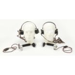 Four British military issue headsets and handsets