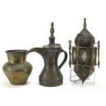 Middle Eastern metalware including an Omani coffee pot and Moroccan hanging lamp, the largest 30.5cm