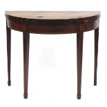 Edwardian inlaid and crossbanded mahogany fold over demi lune card table raised on tapering legs,