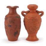 Two Japanese Tokoname terracotta vases including one having dragon handles, both decorated with