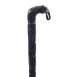 Indian ebonised walking stick carved with an elephant's head, 90cm in length