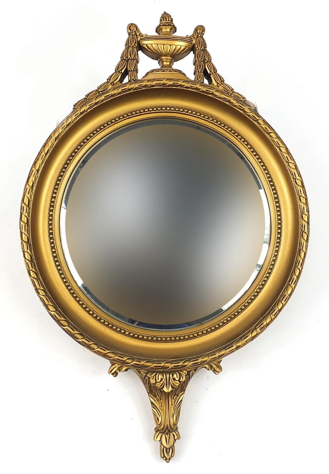 Ornate gilt framed convex mirror with urn, 65.5cm high