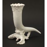 Continental porcelain vase in the form of a cornucopia, 24.5cm high