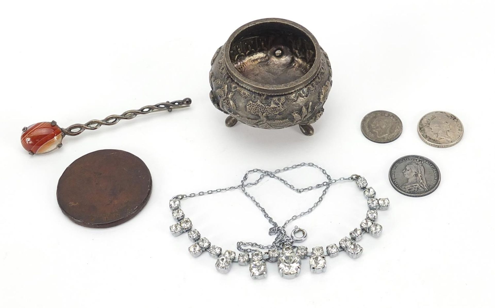 Objects including Indian unmarked silver salt, silver and agate brooch and antique coins