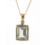9ct gold blue stone and diamond pendant, possibly aquamarine, on a 9ct gold necklace, 1.8cm high and