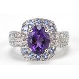 9ct white gold, amethyst, tanzanite and diamond ring, size P, 5.7g