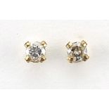 Pair of unmarked gold diamond solitaire stud earrings, 2mm in diameter, 0.5g