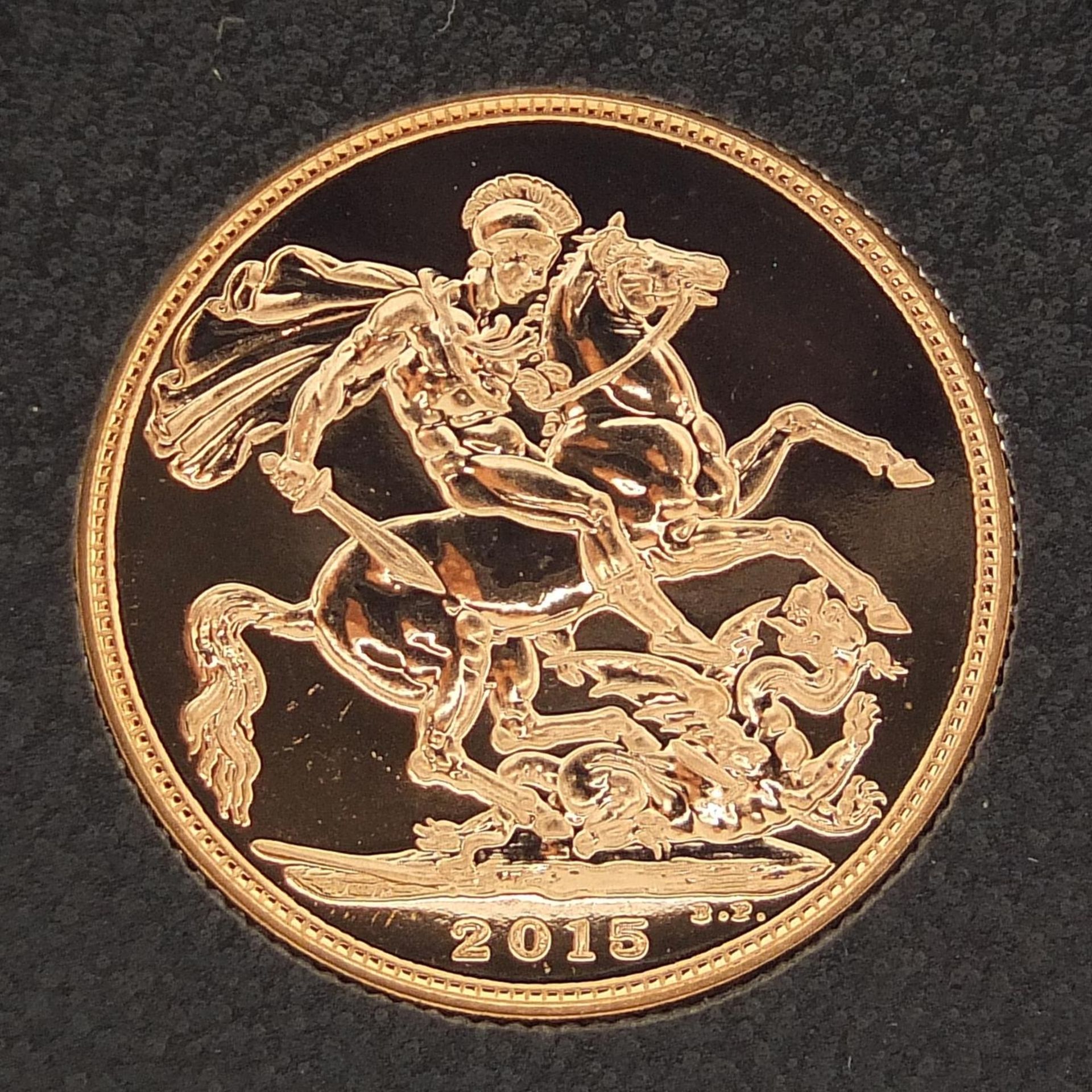 Elizabeth II 2015 gold sovereign housed in portfolio management coin capsule - this lot is sold