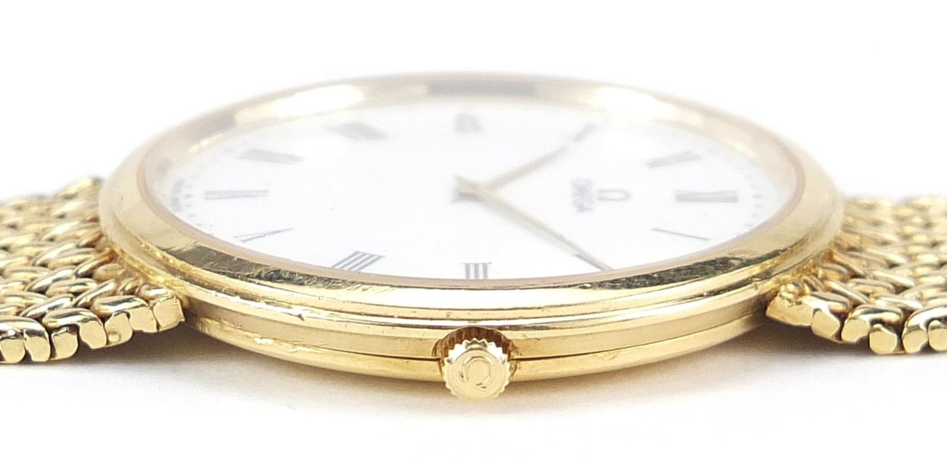 Omega, 18ct gold gentlemen's wristwatch with 18ct gold strap, 31mm in diameter, 71.4g - this lot - Image 7 of 7