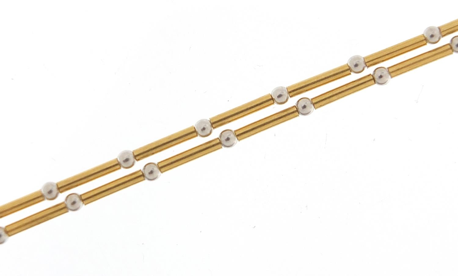 18ct gold two tone necklace, 43cm in length, 8.1g - this lot is sold without buyer's premium