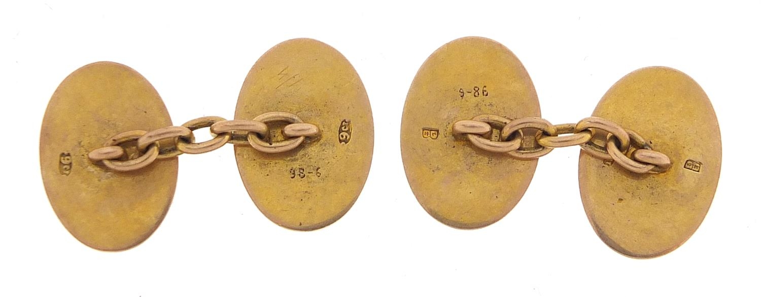 Pair of 9ct gold cufflinks with engraved decoration, 1.6cm wide, 6.4g - this lot is sold without - Image 2 of 3