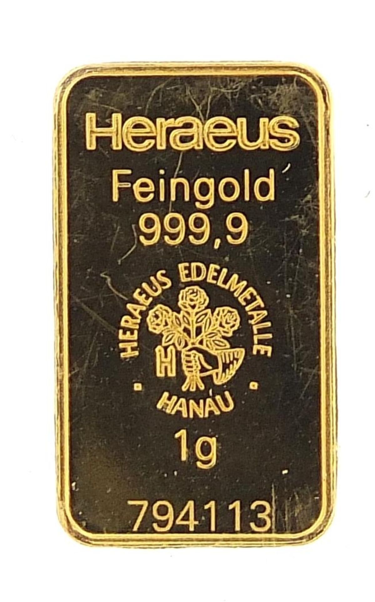 1.0g fine gold ingot with capsule - this lot is sold without buyer's premium