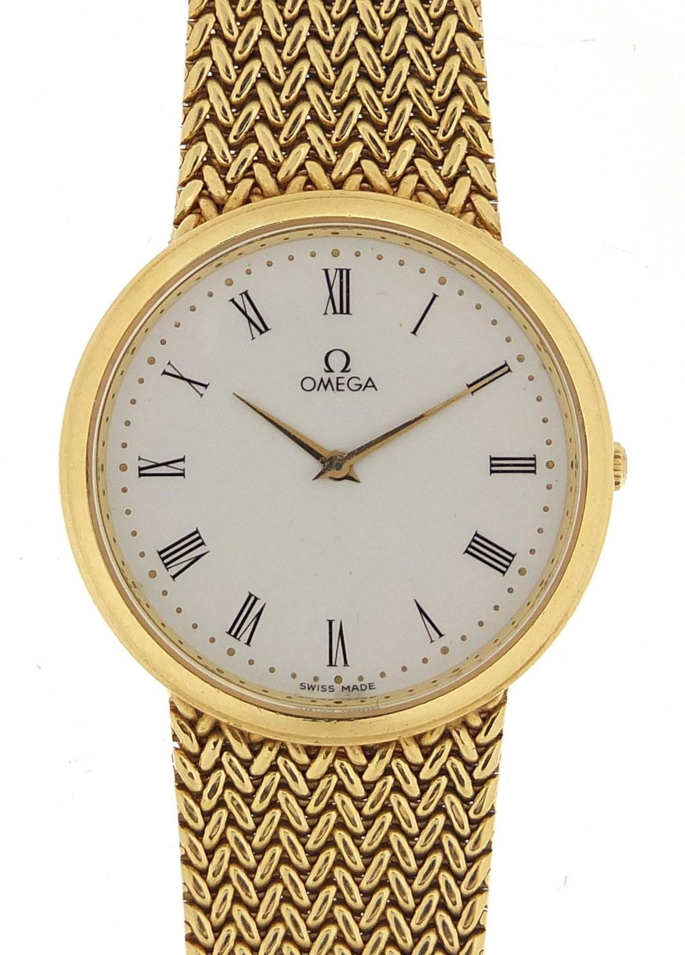 Omega, 18ct gold gentlemen's wristwatch with 18ct gold strap, 31mm in diameter, 71.4g - this lot