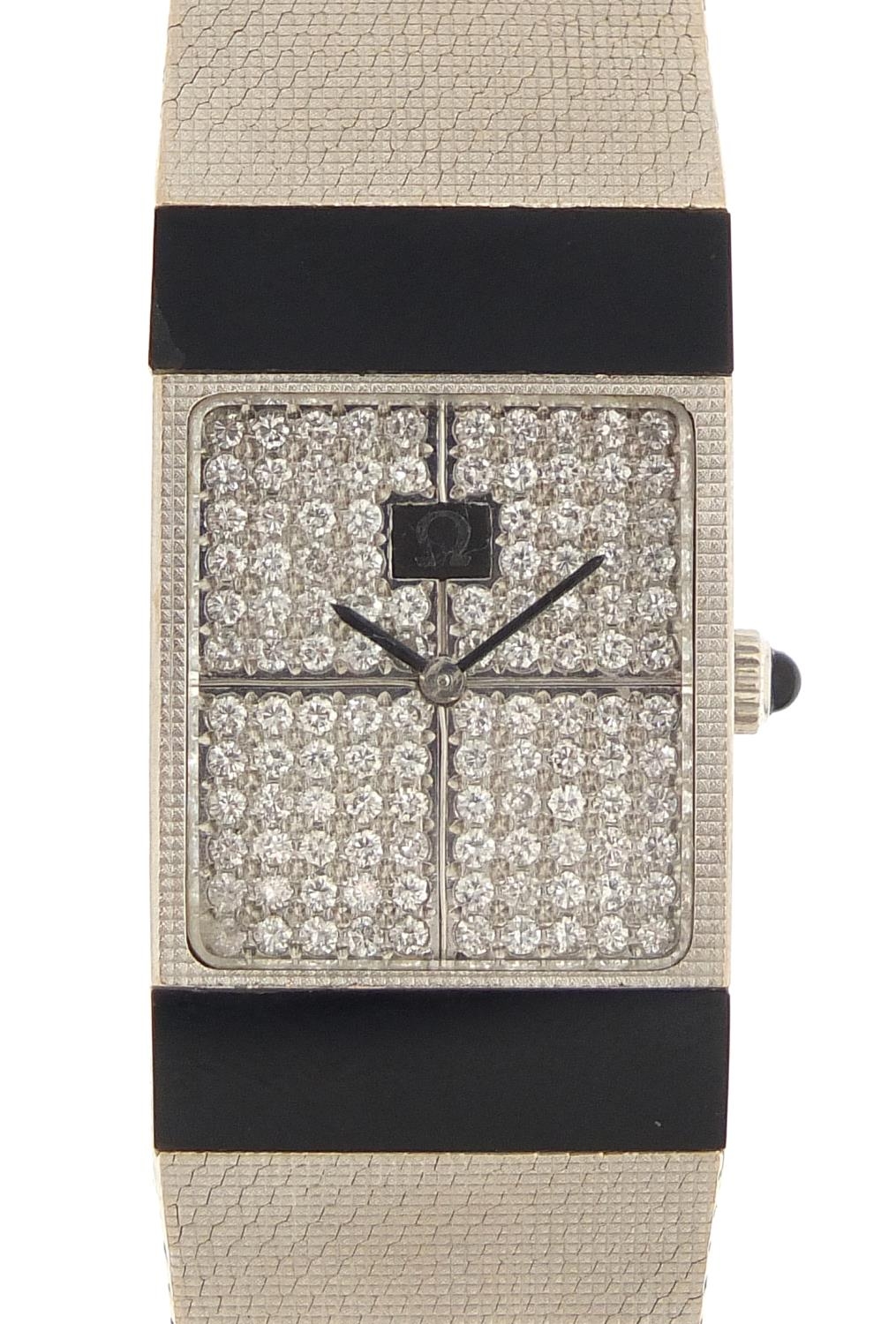 Omega, 18ct white gold wristwatch with diamond set dial and 18ct white gold strap, the movement