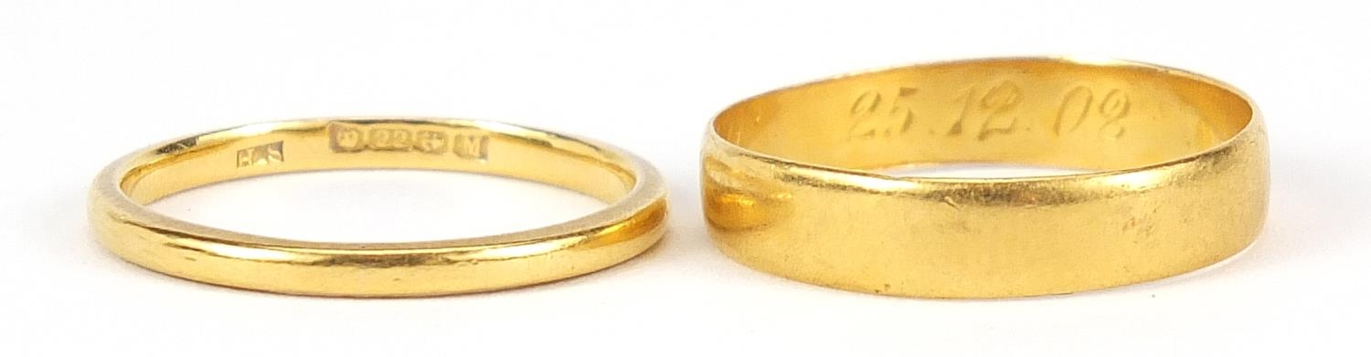 Two 22ct gold wedding bands, sizes L and M, 3.5g - this lot is sold without buyer's premium