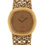 Omega, ladies 9ct gold wristwatch with 9ct gold strap, the case 18mm wide, 36.0g - this lot is