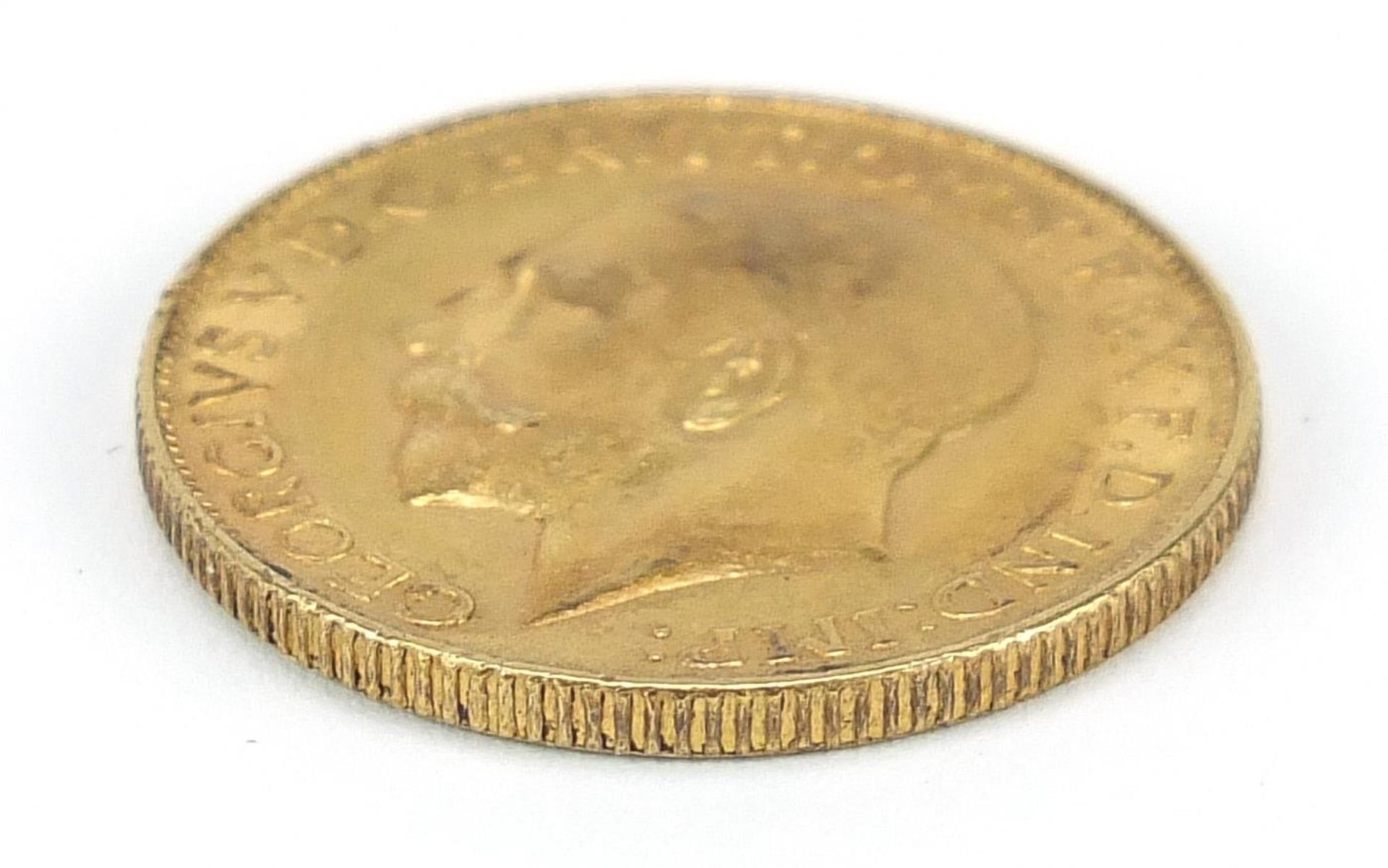 George V 1928 gold sovereign, South African mint - this lot is sold without buyer's premium - Image 3 of 3