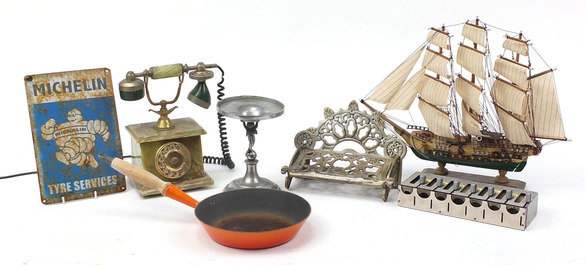 Sundry items including a wooden model of HMS Victory, vintage coin sorter, Michelin advertising