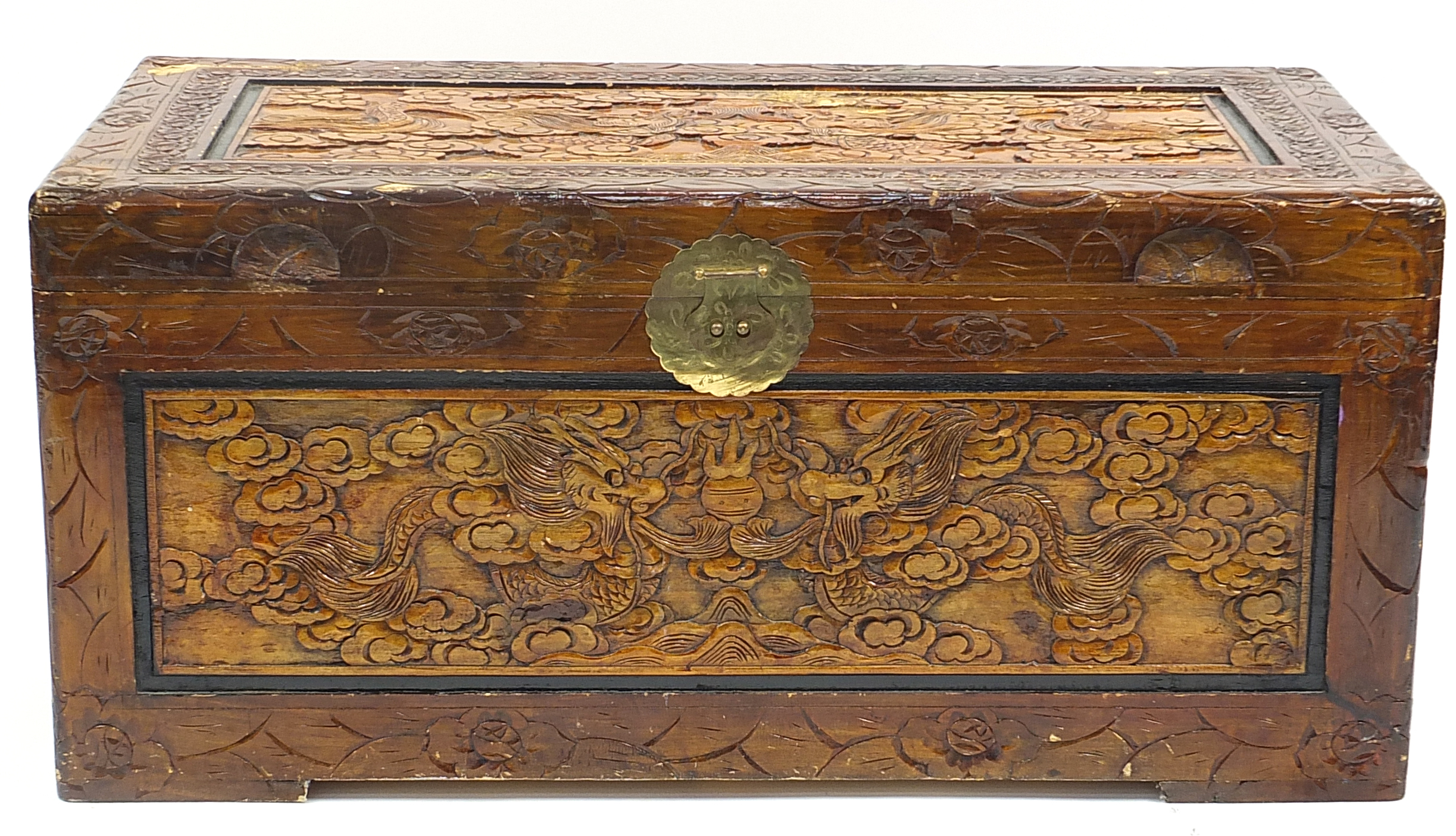 Chinese camphor wood trunk carved with dragons amongst clouds, 46cm H x 101cm W x 53cm D