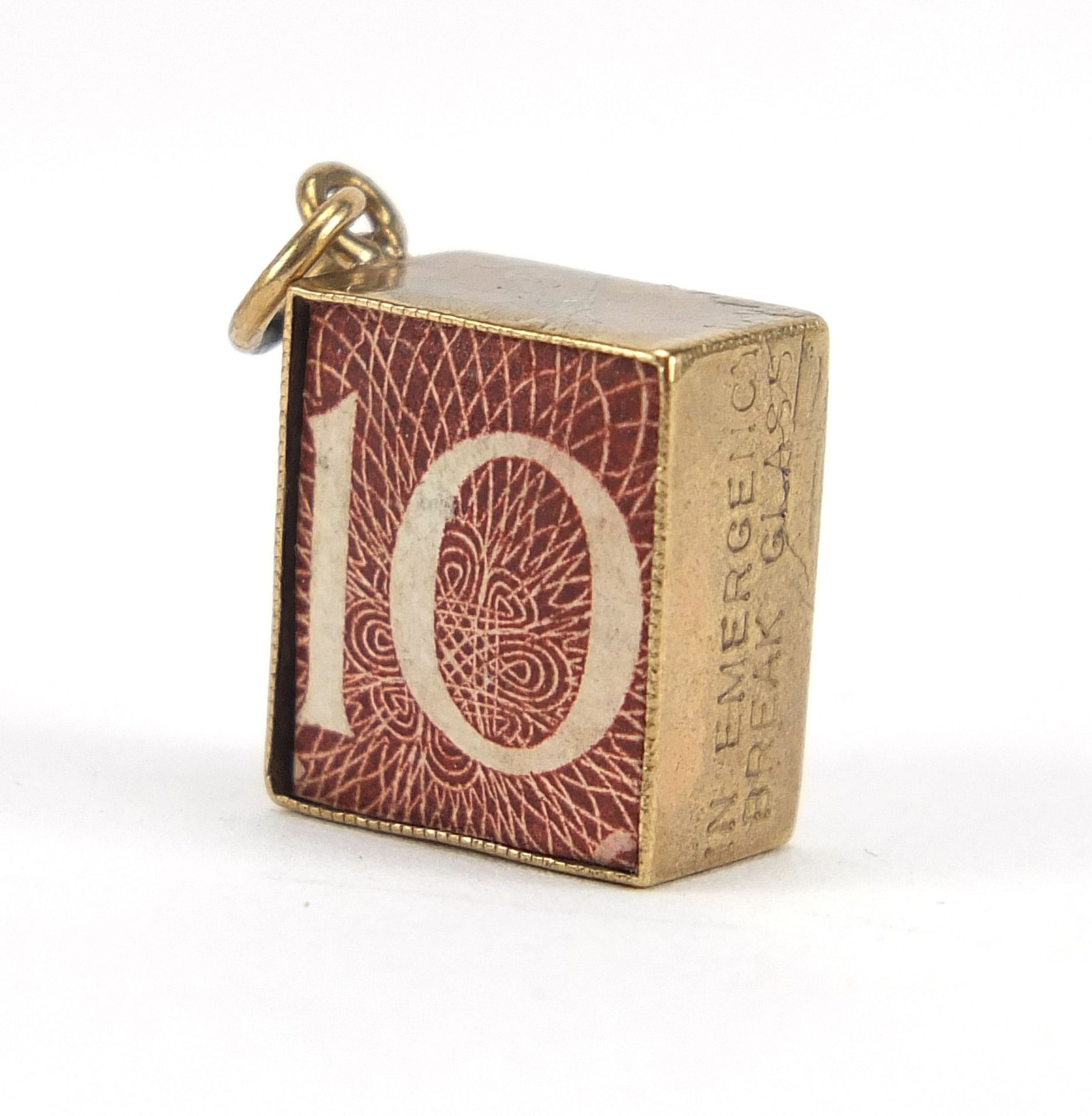 9ct gold emergency ten shilling note charm, 1.2cm wide, 2.3g