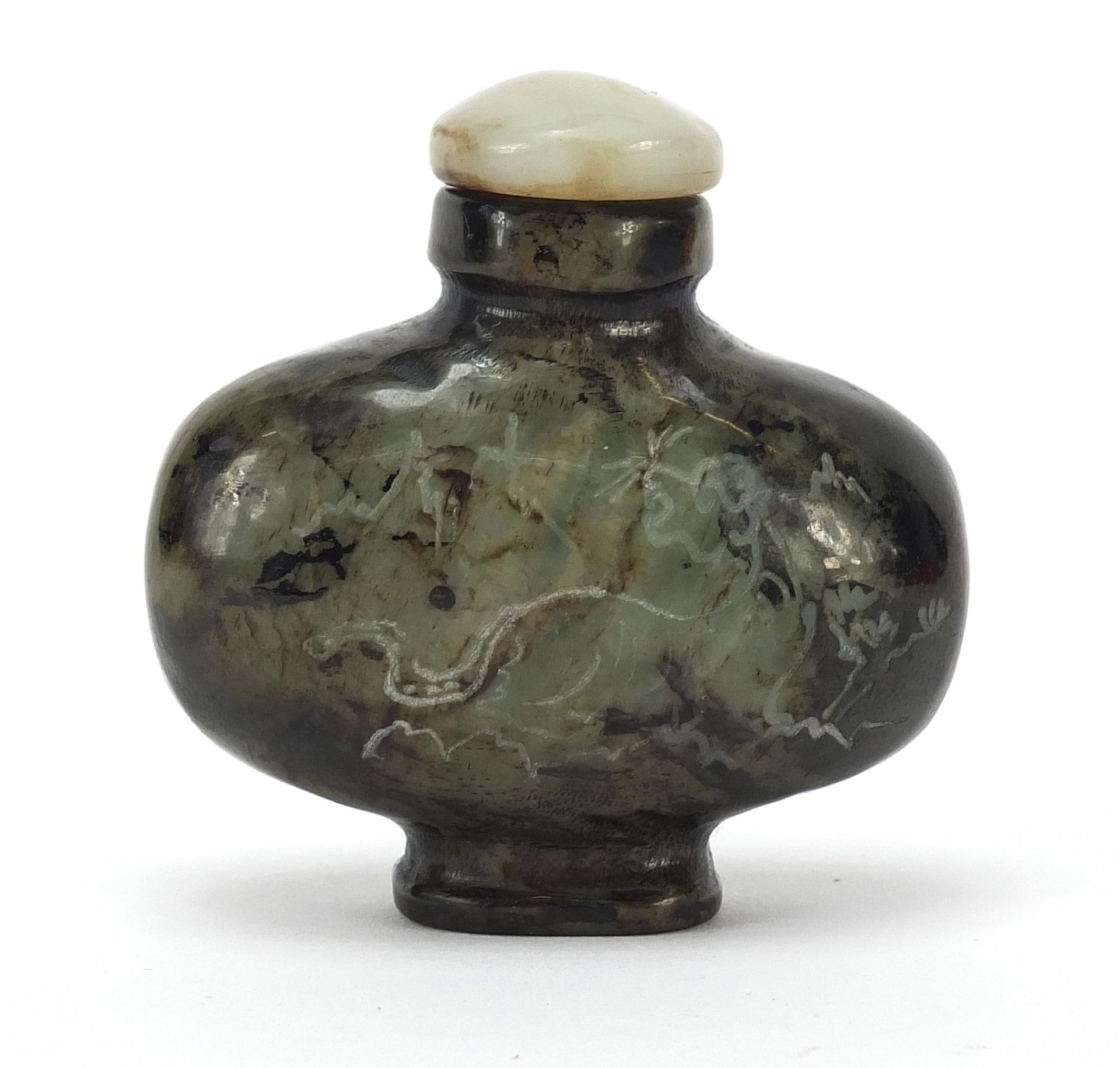 Chinese jade snuff bottle carved with a dragon in a mountainous landscape and calligraphy, 6cm high