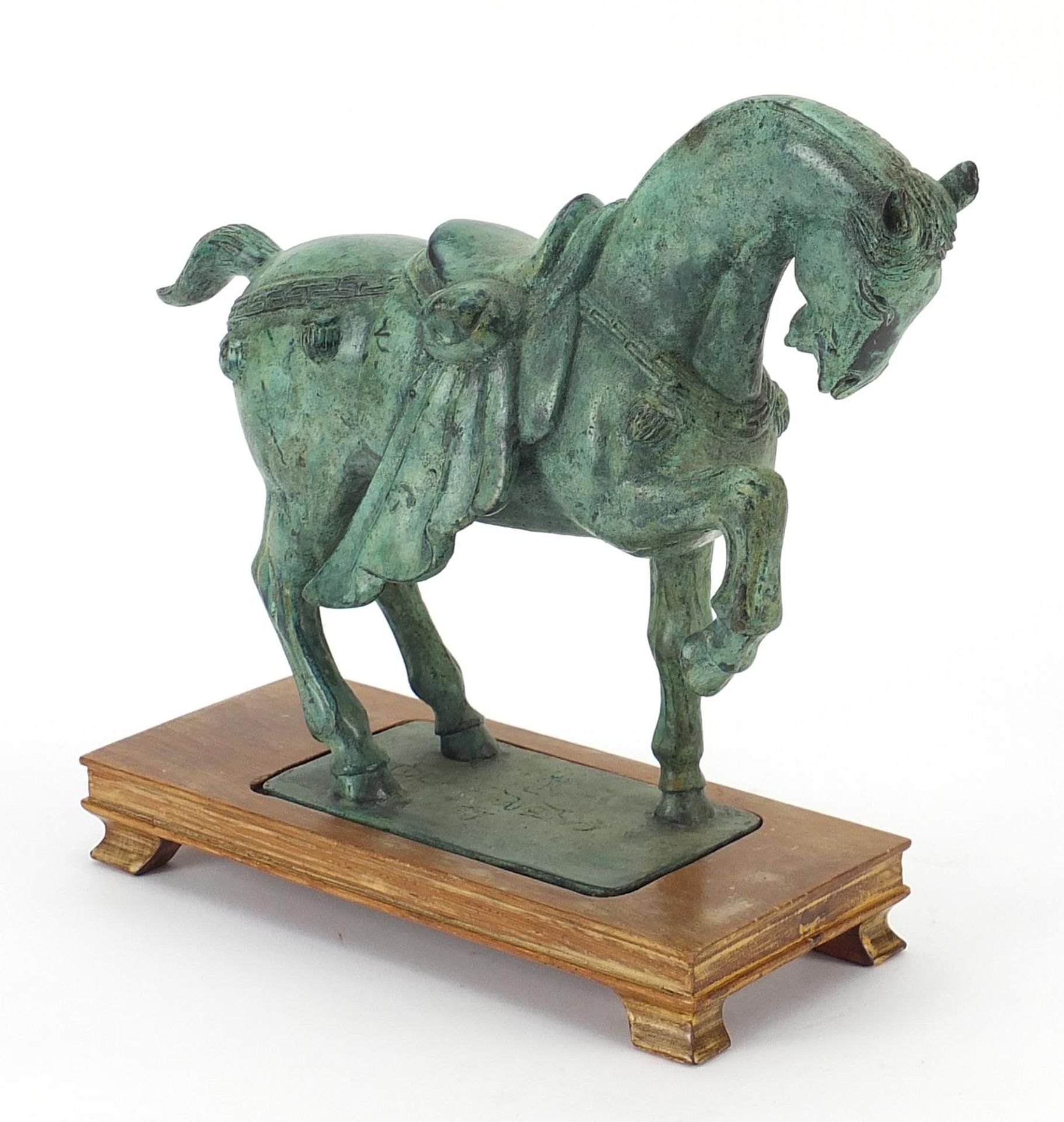Chinese Verdigris bronzed model of a Tang horse on rectangular wood stand, 27cm in length