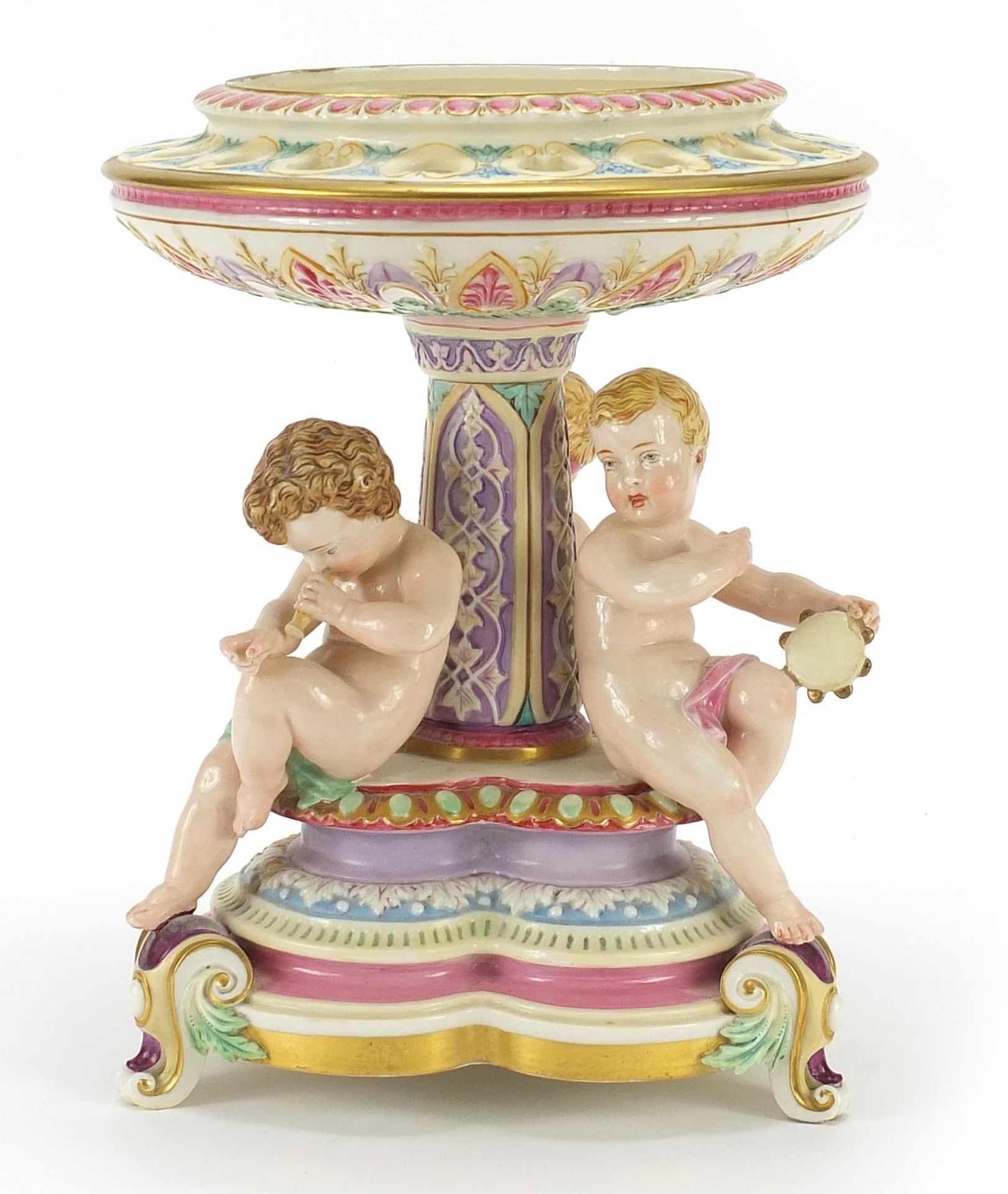 Royal Worcester, Victorian porcelain centrepiece surmounted with three children with instruments,