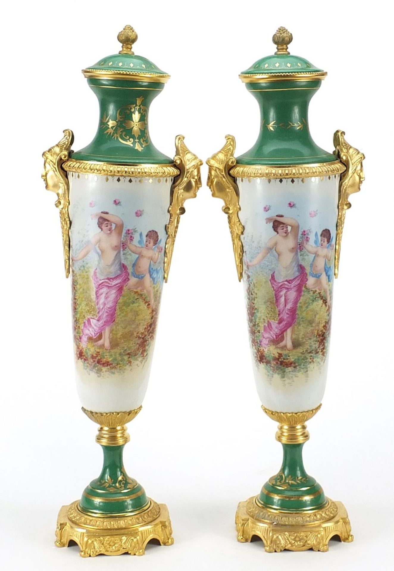 Large pair of French porcelain vases and covers with gilt bronze mounts in the style of Sevres, each