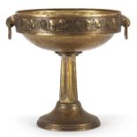 Art Deco bronzed centrepiece with twin handles decorated in relief with leaves and berries, 29cm