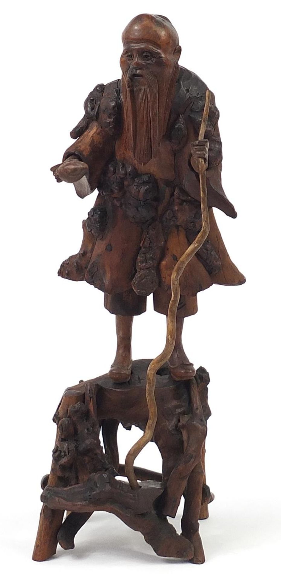 Chinese root wood carving of an elder holding a staff, 51cm high