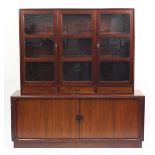 Dyrlund, Danish rosewood wall unit with three glazed doors above two sliding tambour doors,