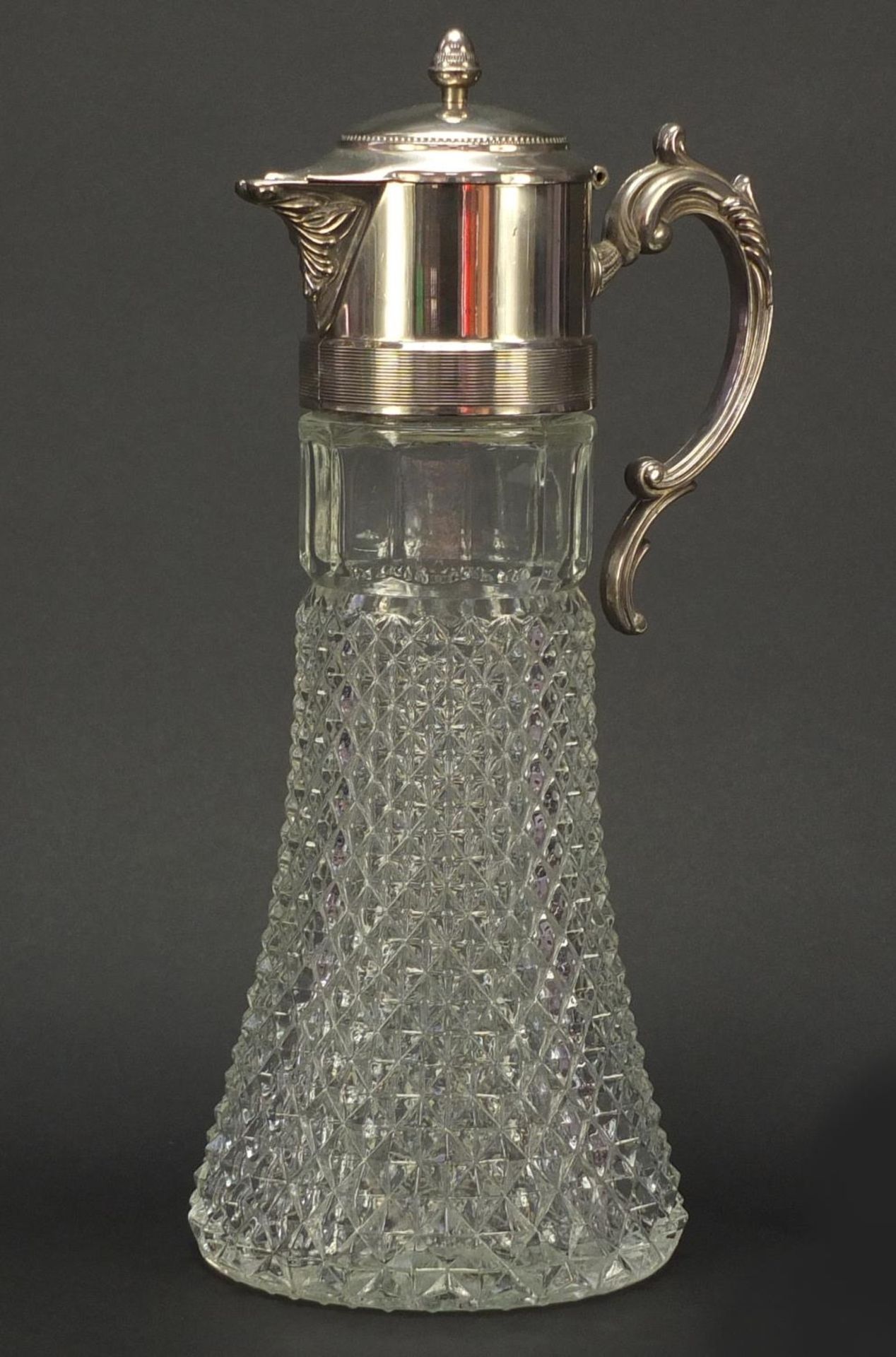 Large glass claret jug with silver plated mounts, 36cm high
